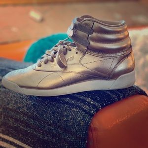 Gold Reebok Freestyle sneaker size 7.5